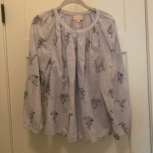 Light purple blouse with embroidered flowers